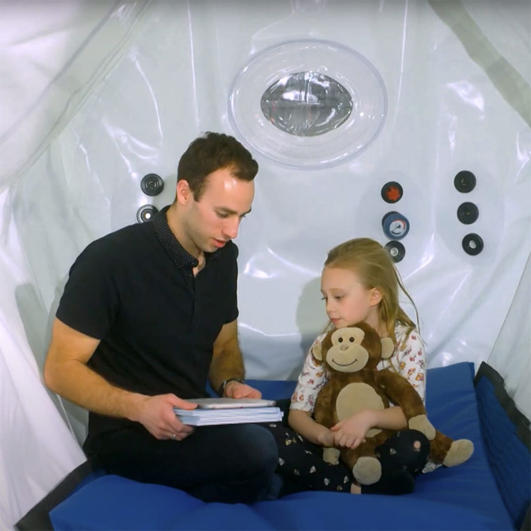 Father and Daughter in Hyperbaric Oxygen Chamber