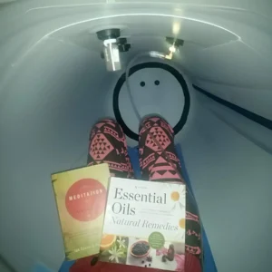 newtowne-hyperbaric-chamber-customer-reading-book